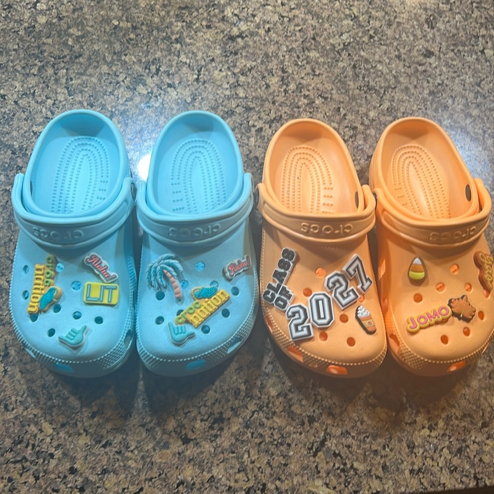 2 pair of Crocs